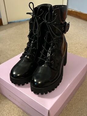 Steve Madden Women’s Black Lace-Up Platform Combat Boots